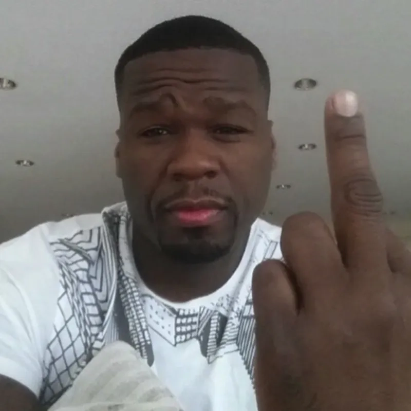 The classic 50 Cent laughing meme perfectly captures pure amusement