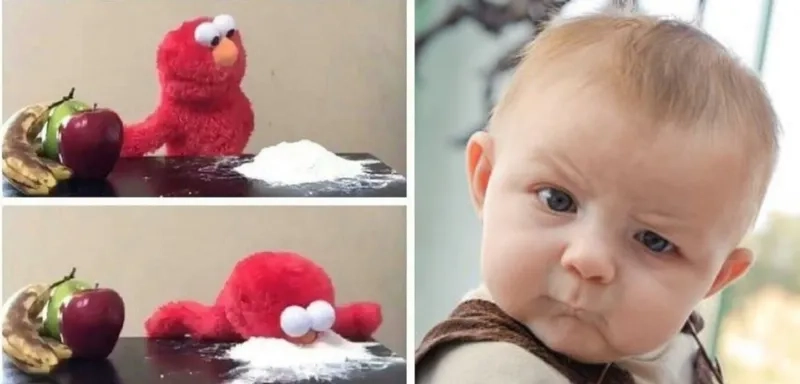 A classic reaction using the Elmo shrug meme