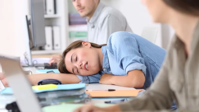 A patient undergoing a narcolepsy test in a sleep lab