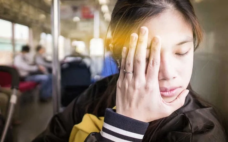 Someone practicing deep breathing to calm a panic attack