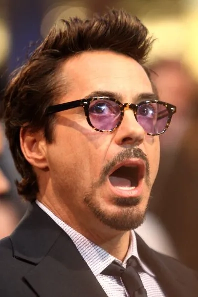Tony Stark in a classic Iron Man meme pose
