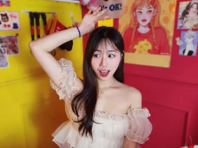 Asian girl sex lounges silk sheets blindfold whisper pose